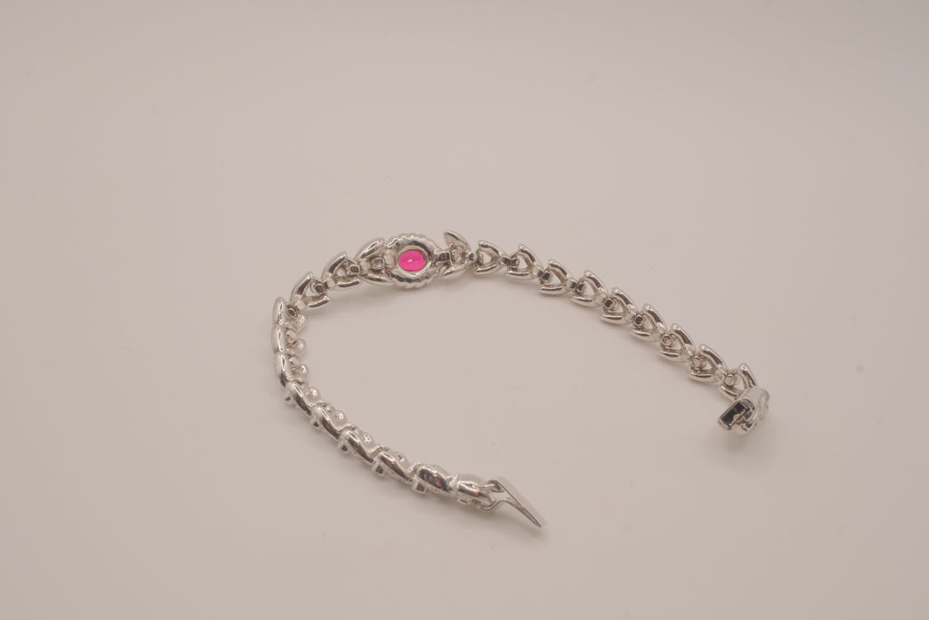 Oval-cut red stone tennis bracelet