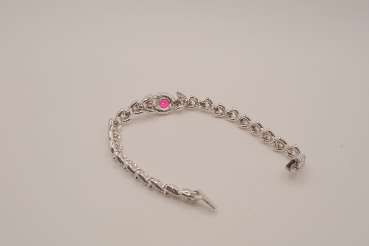 Oval-cut red stone tennis bracelet