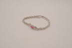 Oval-cut red stone tennis bracelet