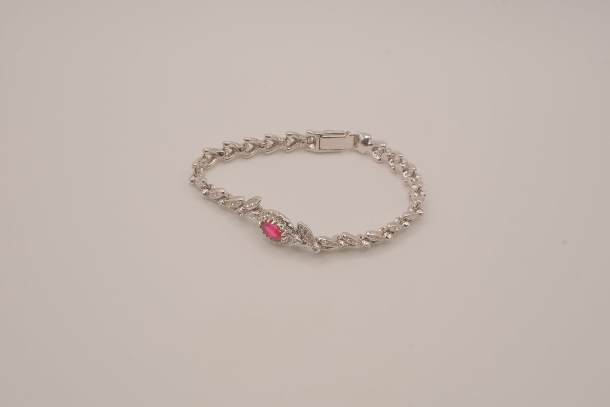 Oval-cut red stone tennis bracelet