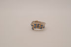 Vintage multi-band harem ring featuring blue stones