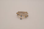 Vintage multi-band harem ring featuring blue stones