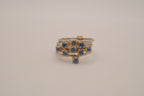 Vintage multi-band harem ring featuring blue stones
