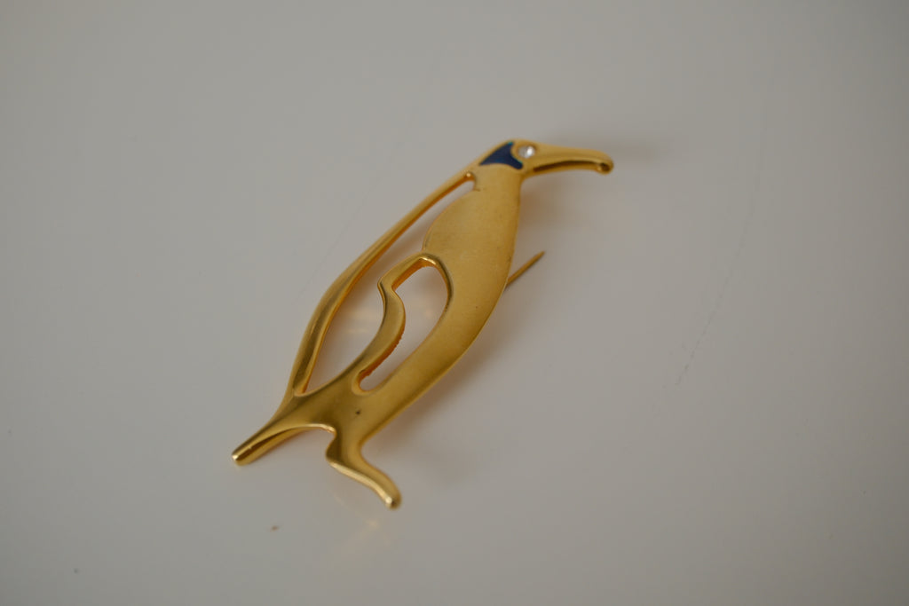 Vintage gold-toned stylized penguin