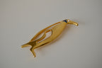 Vintage gold-toned stylized penguin