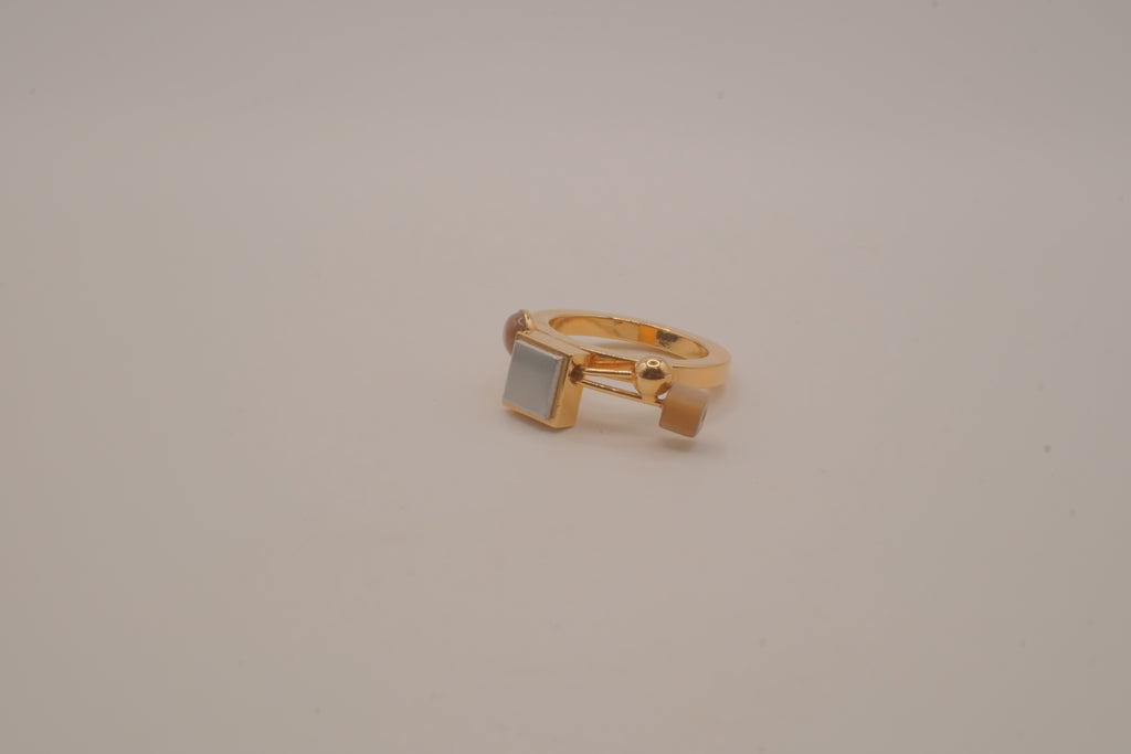 Contemporary multi-element stack geometric ring