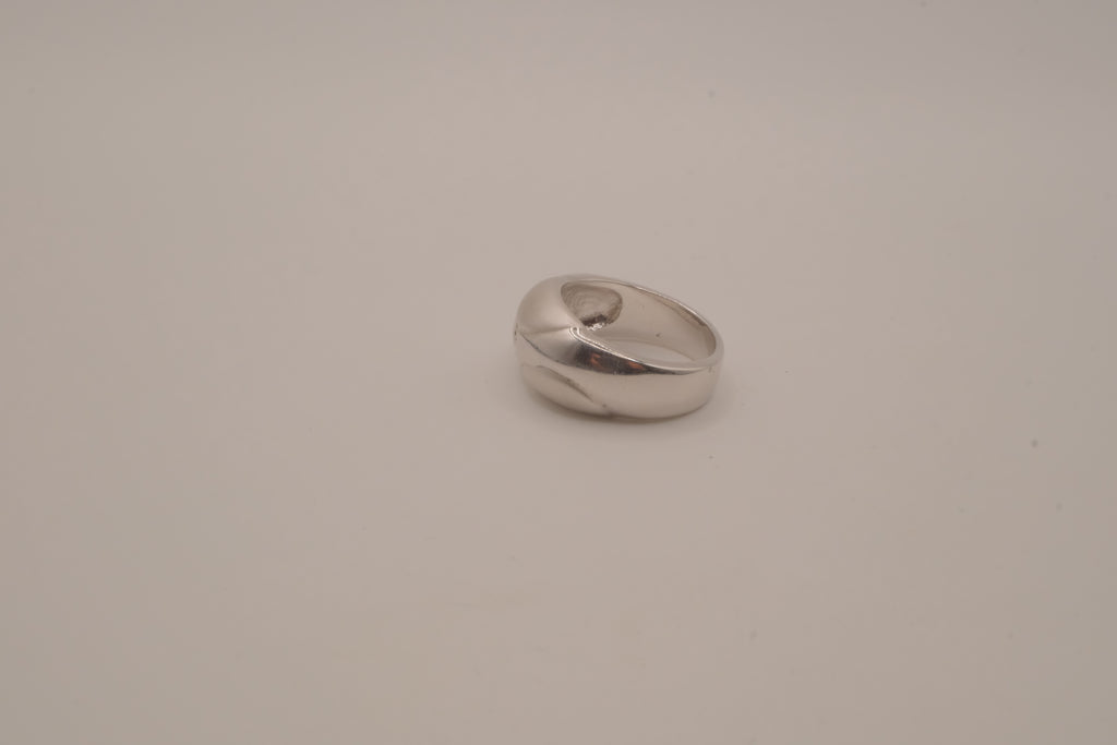 Modernist silver tone flush-set stone ring