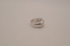 Modernist silver tone flush-set stone ring