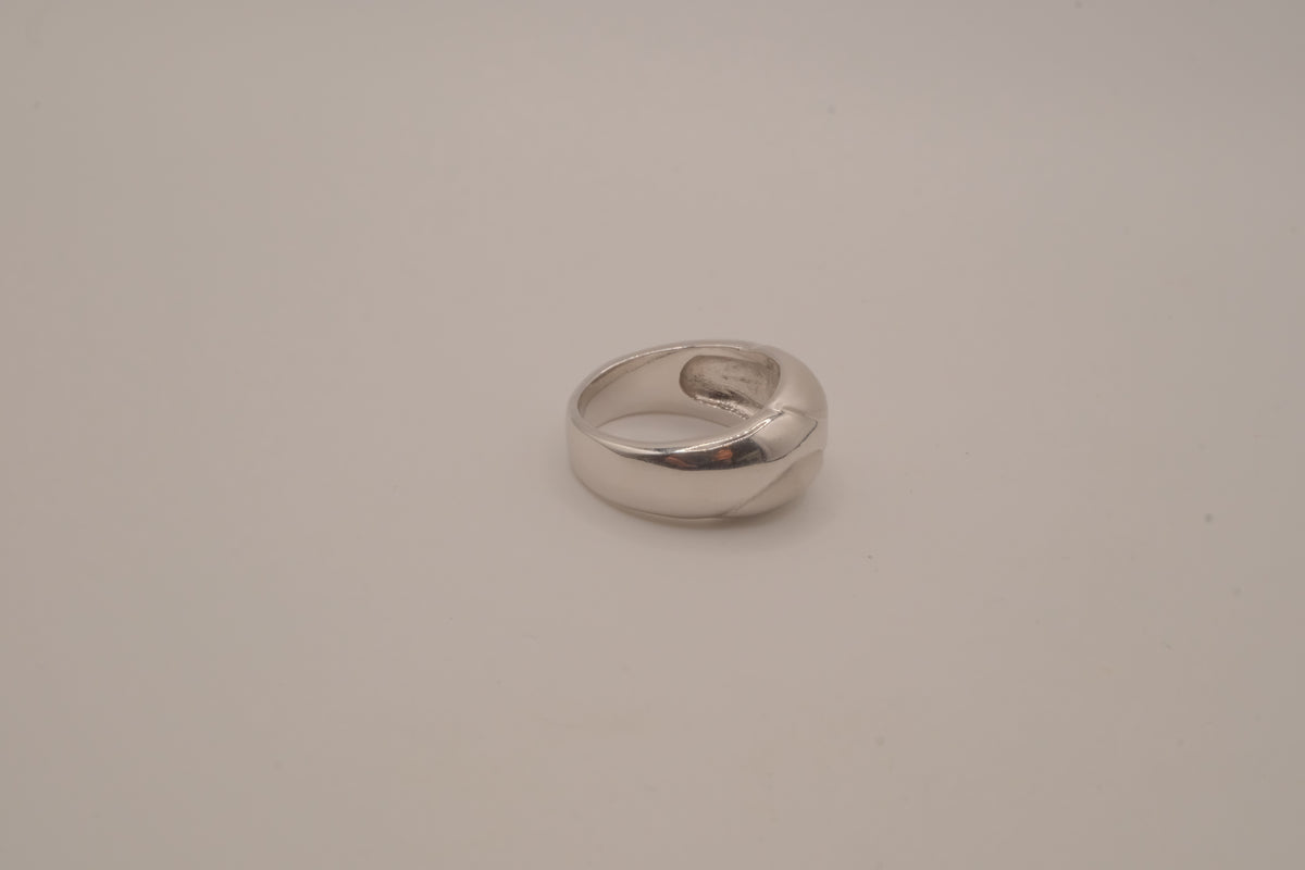 Modernist silver tone flush-set stone ring