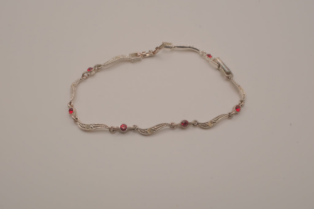 Vintage Avon wavy link rhinestone bracelet