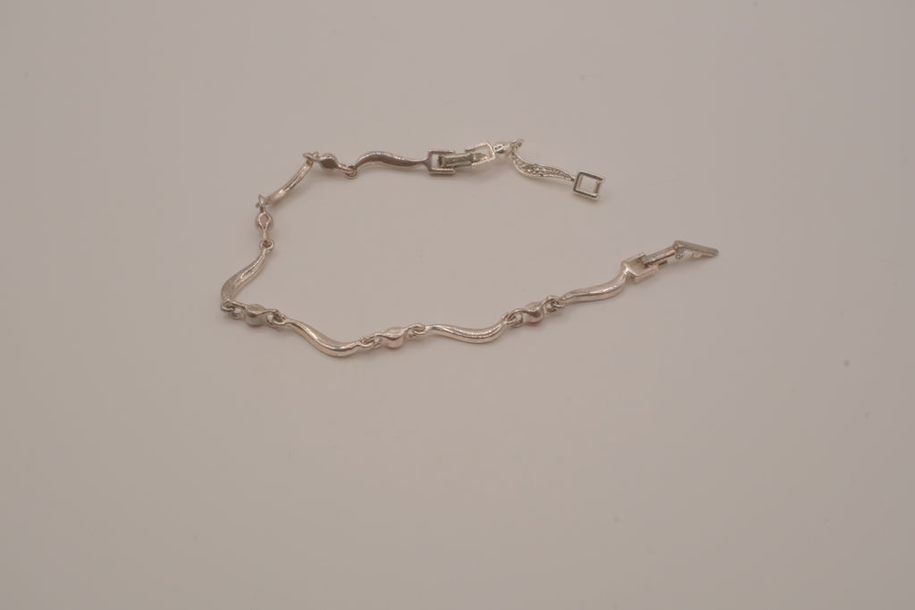 Vintage Avon wavy link rhinestone bracelet
