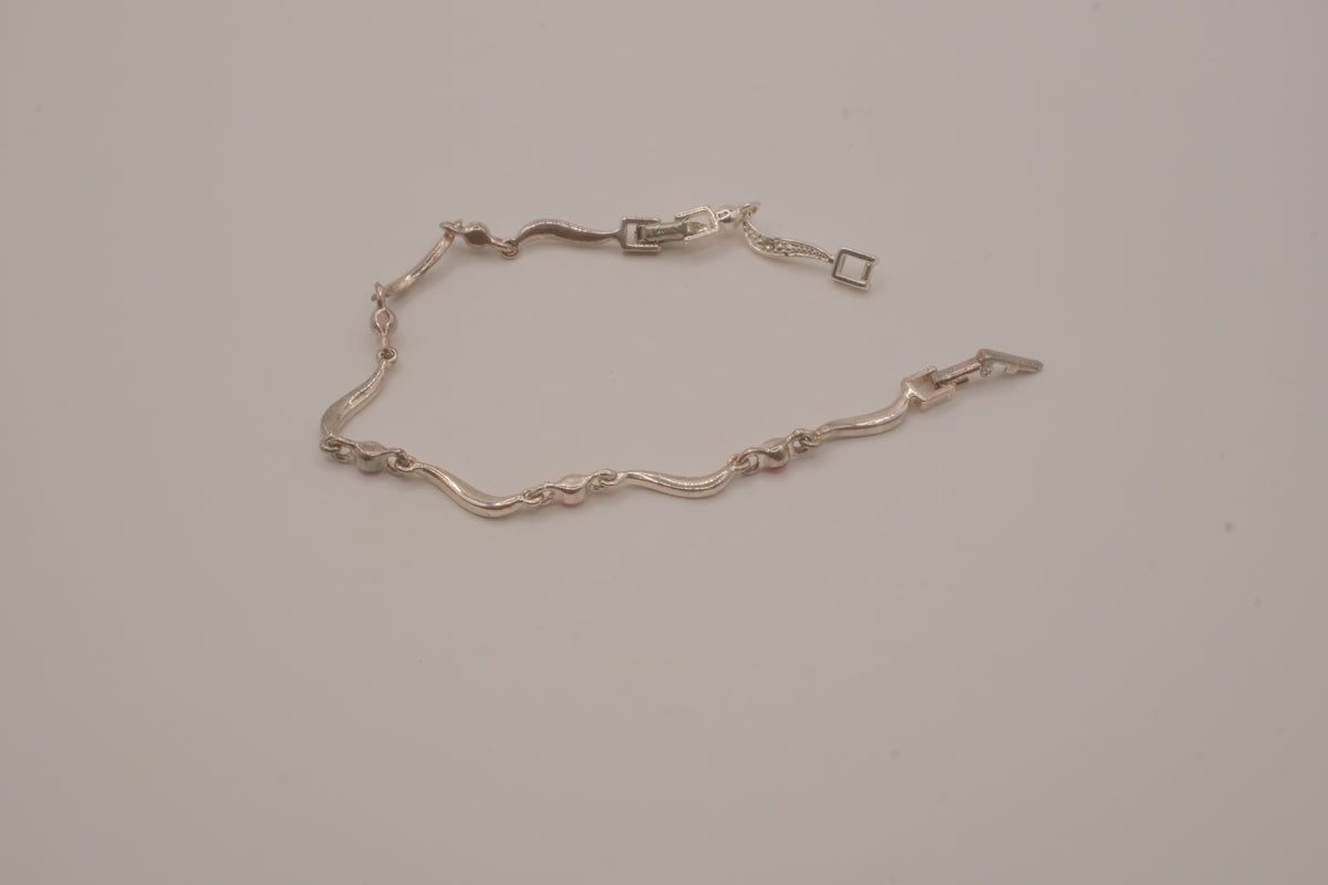 Vintage Avon wavy link rhinestone bracelet
