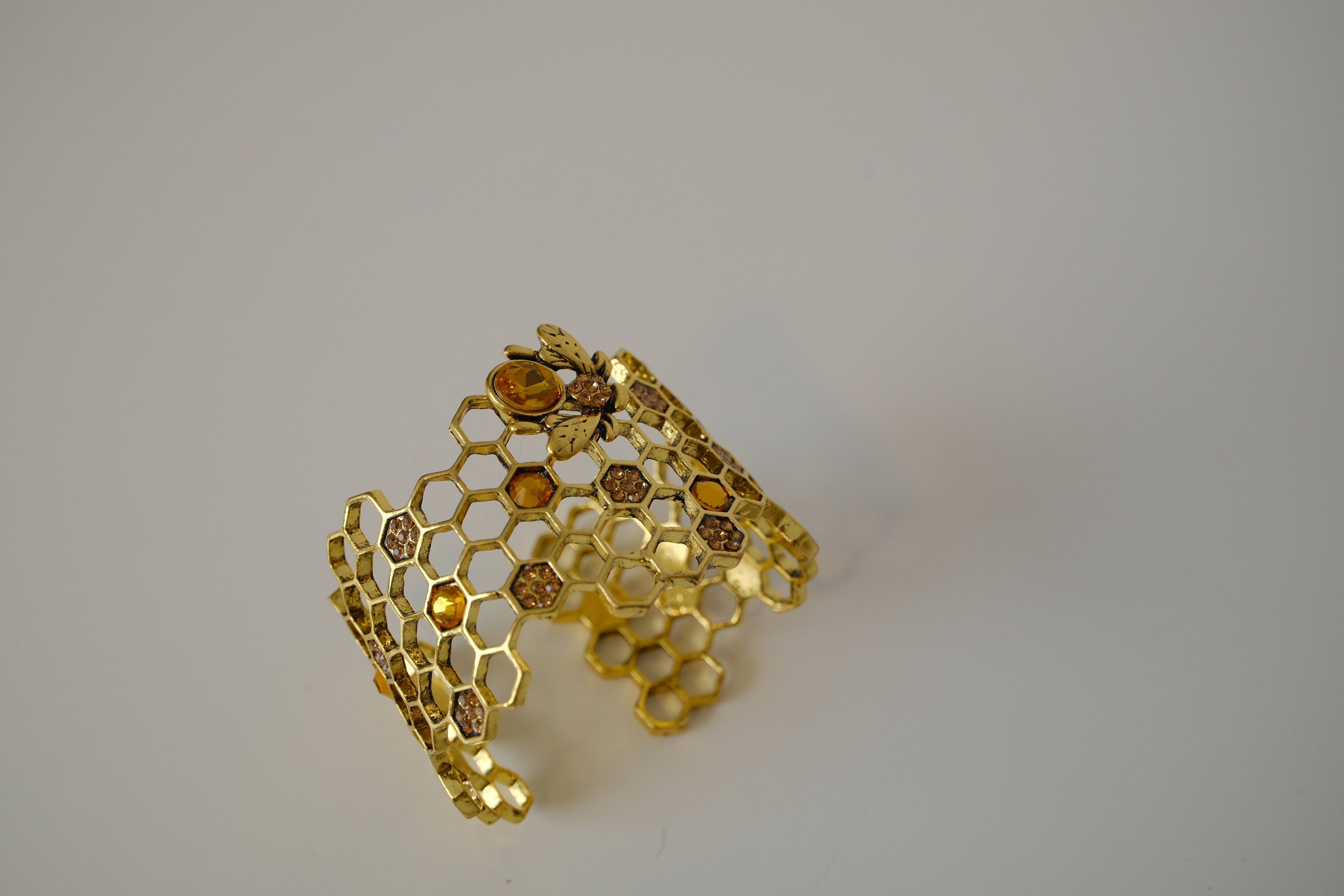 Honeycomb Gold toned cuff bracelet