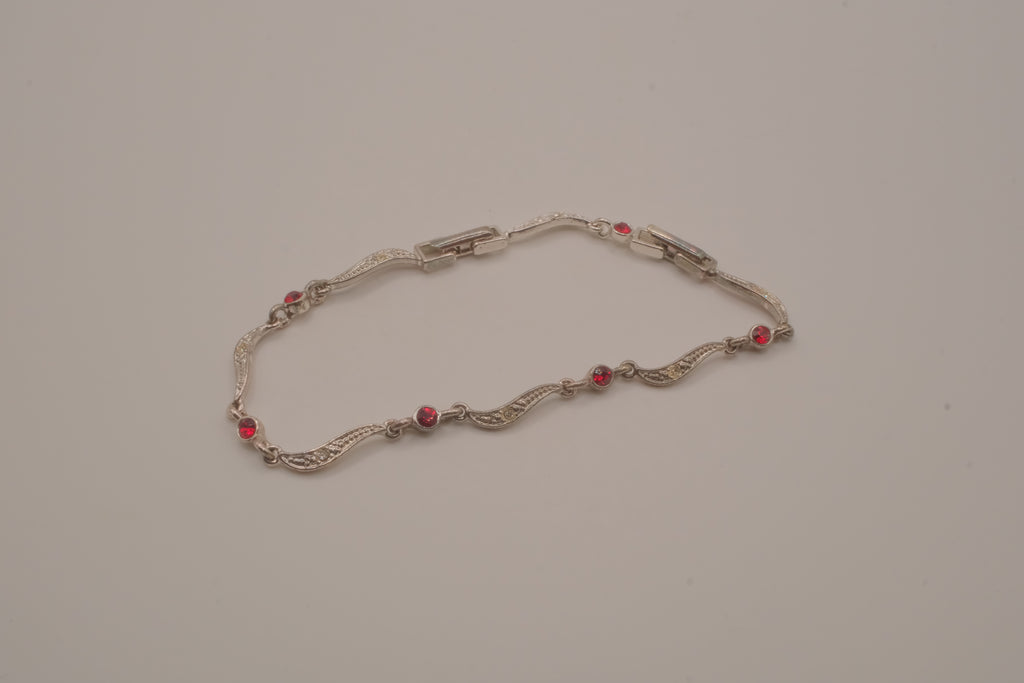 Vintage Avon wavy link rhinestone bracelet