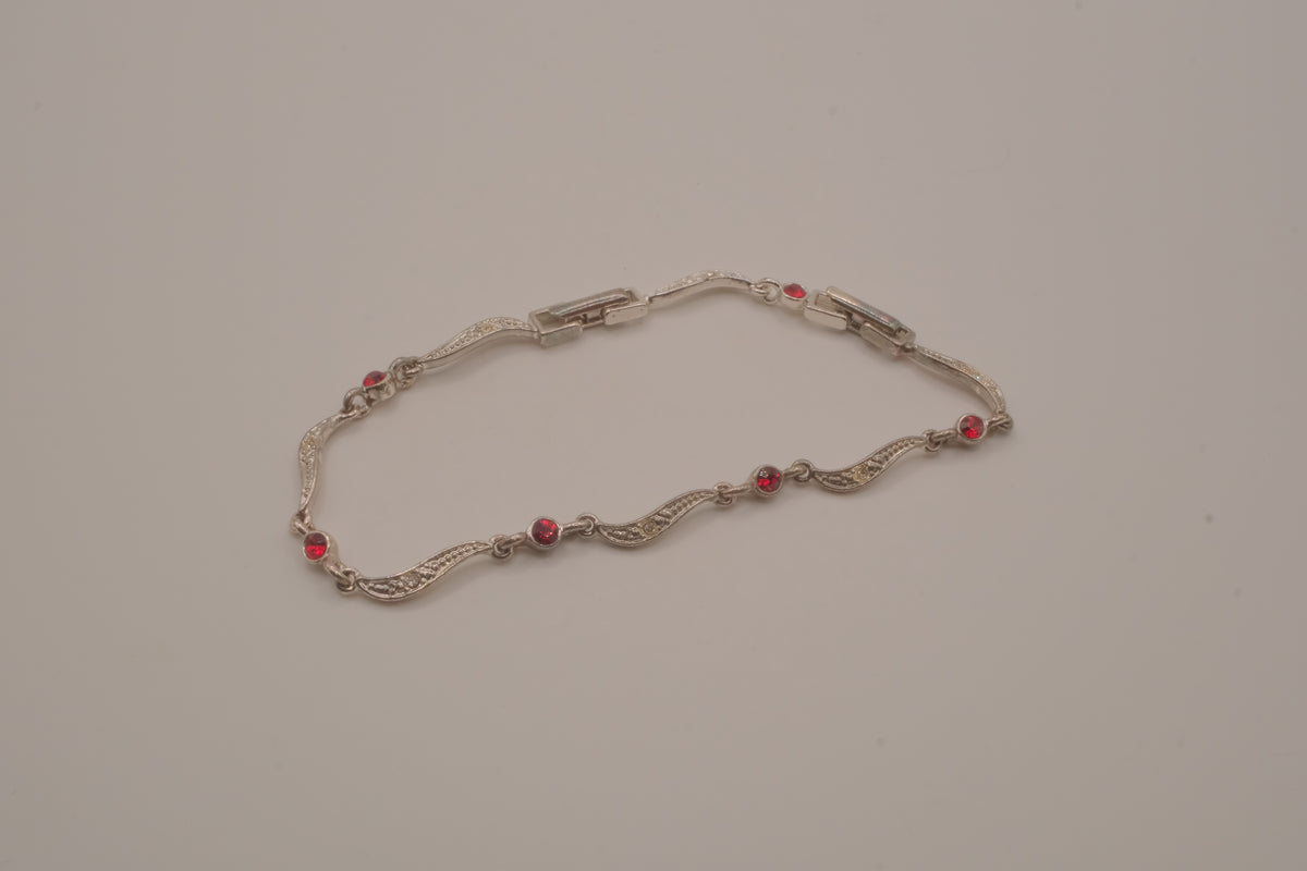 Vintage Avon wavy link rhinestone bracelet