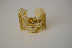 Honeycomb Gold toned cuff bracelet