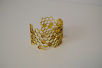 Honeycomb Gold toned cuff bracelet