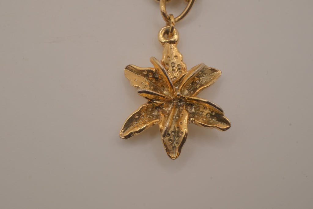 Vintage textured lily pendant charm bracelet