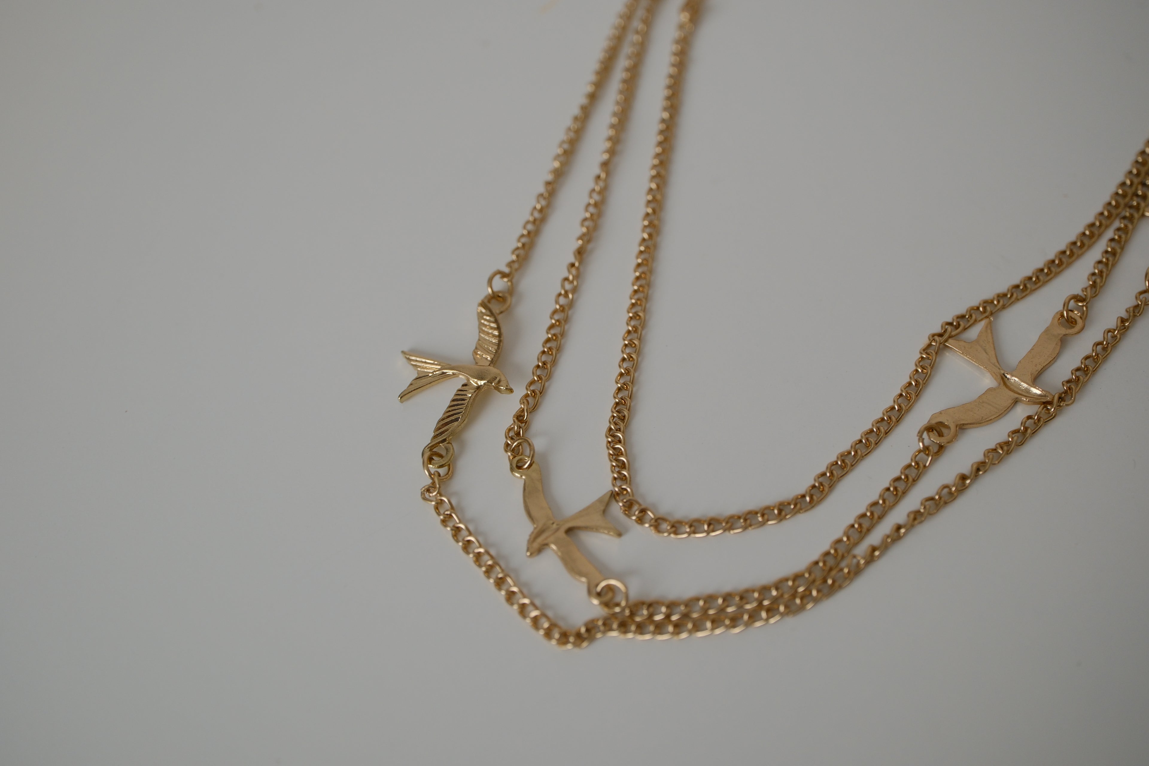 Vintage triple-layered flying birds necklace