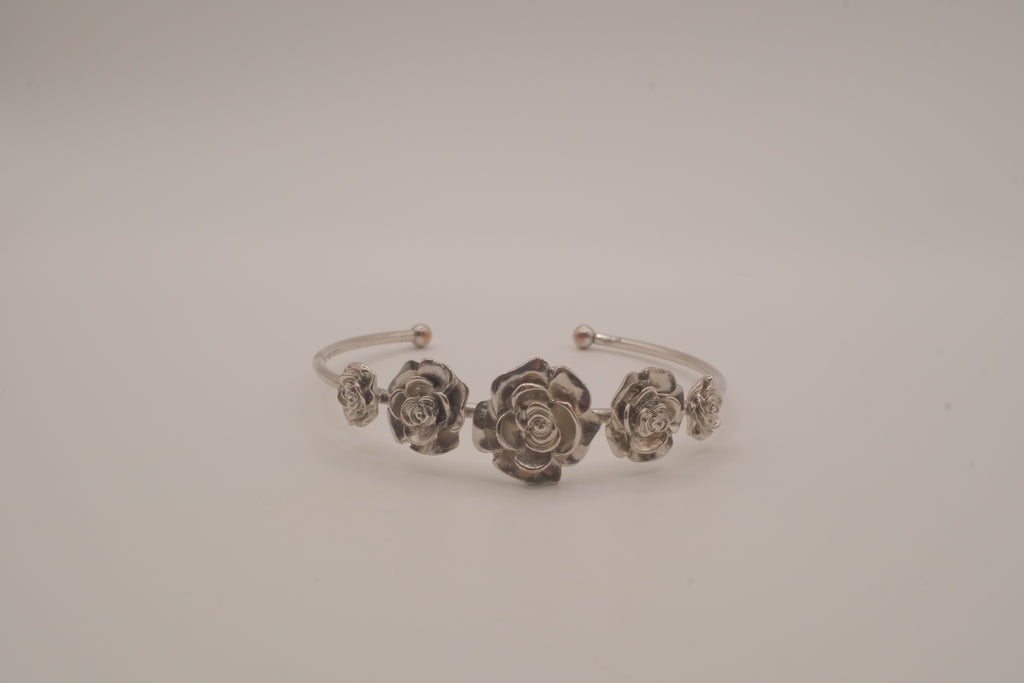 Silver tone rose cuff bracelet