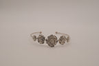 Silver tone rose cuff bracelet
