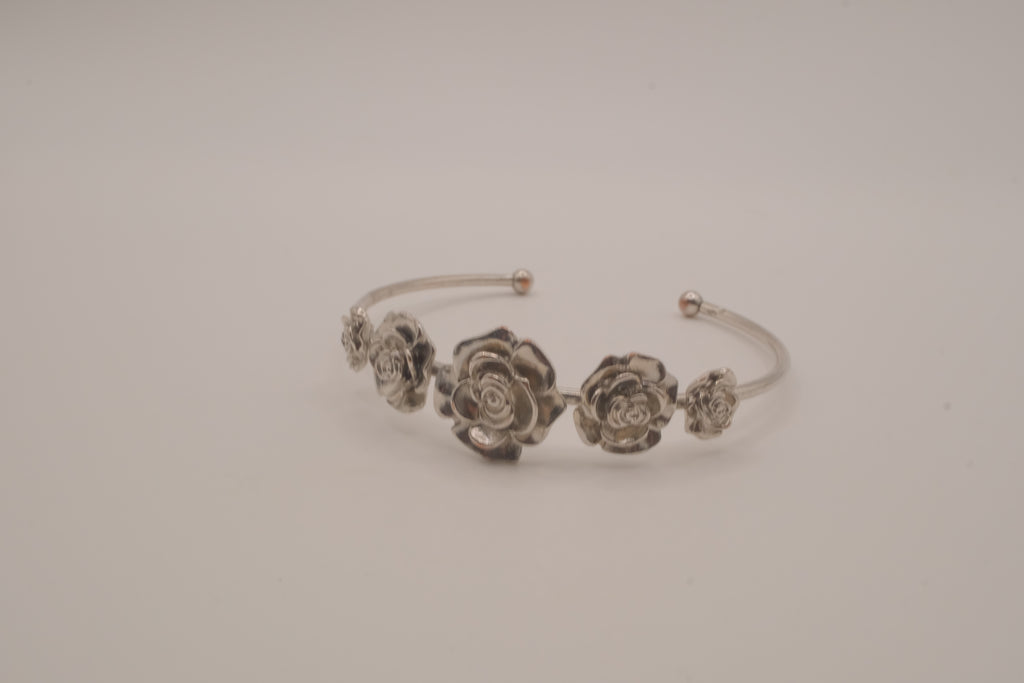 Silver tone rose cuff bracelet