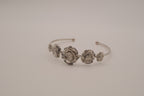 Silver tone rose cuff bracelet
