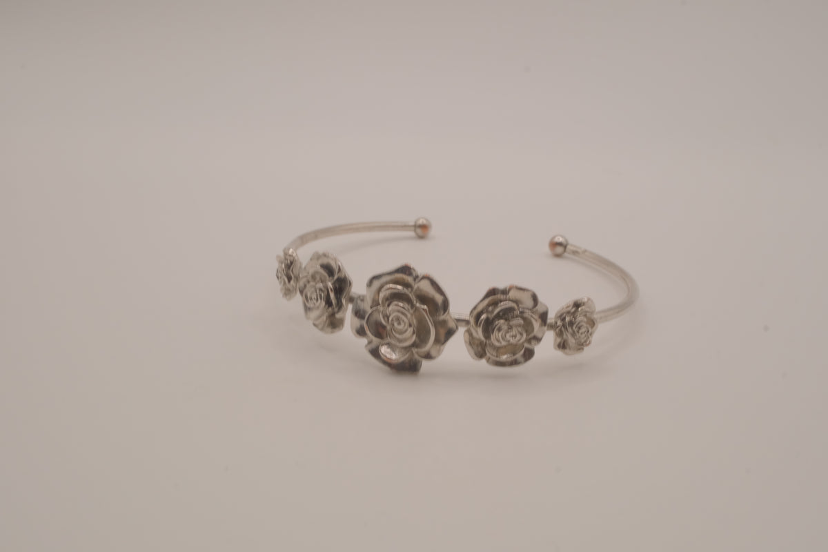Silver tone rose cuff bracelet