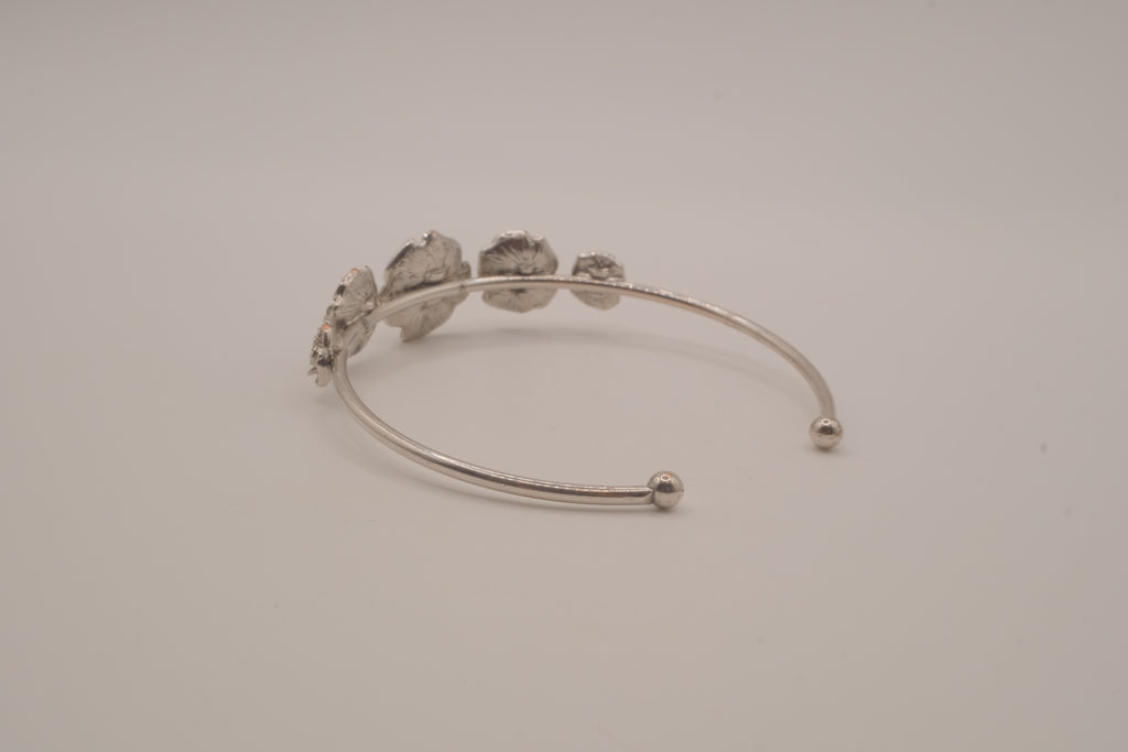 Silver tone rose cuff bracelet