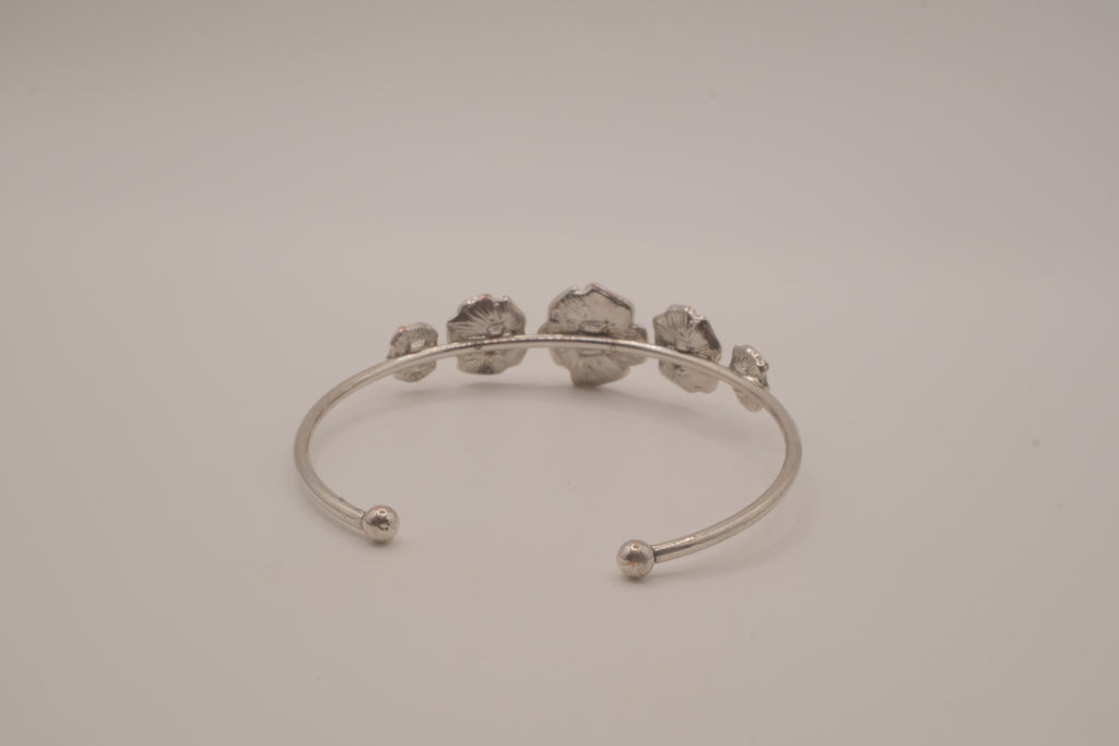 Silver tone rose cuff bracelet