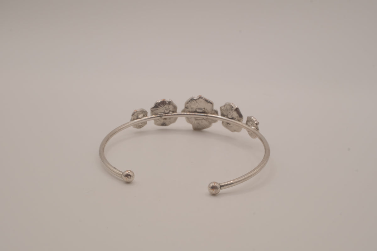 Silver tone rose cuff bracelet