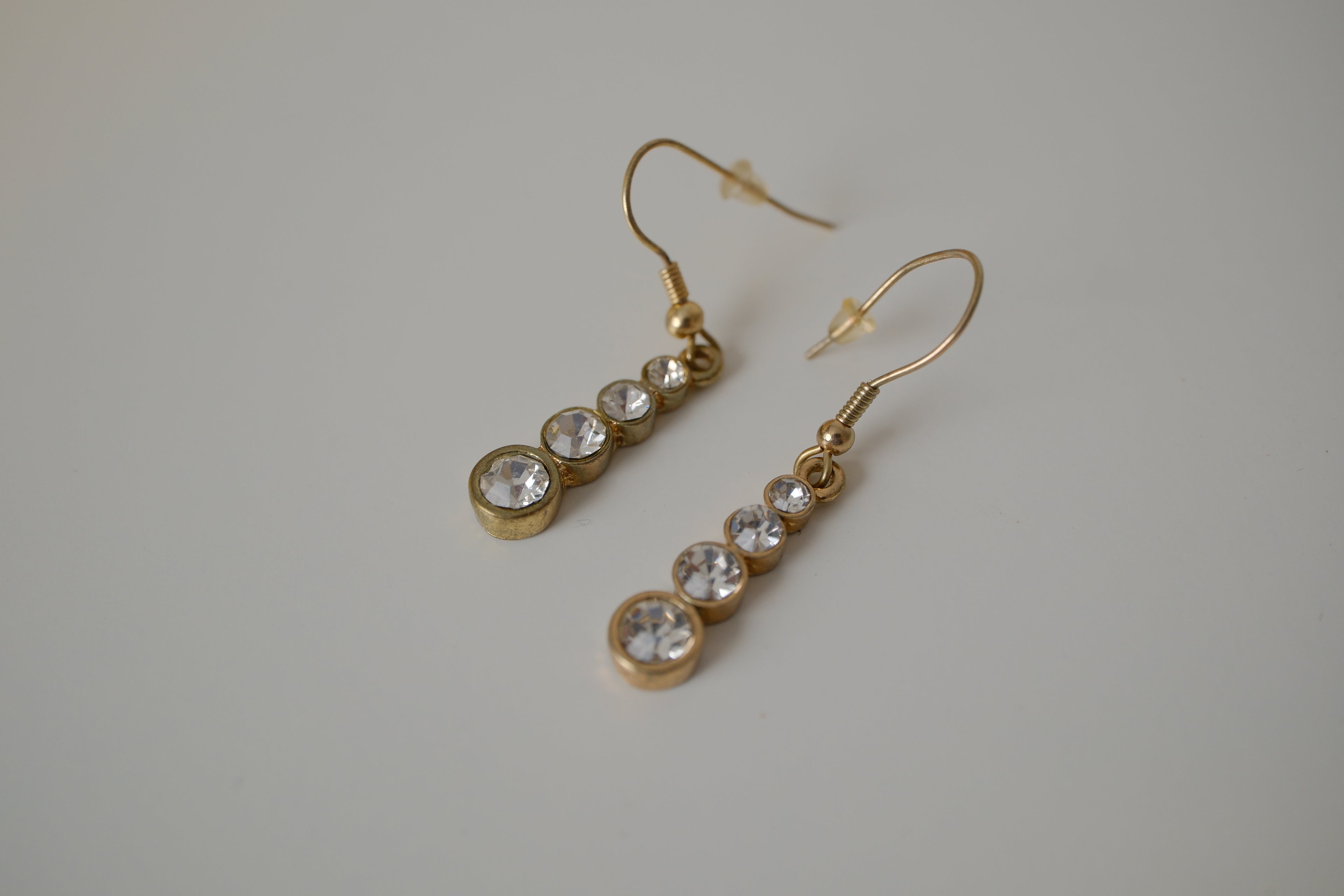 Vintage gold-toned graduated crystal dangle earrings