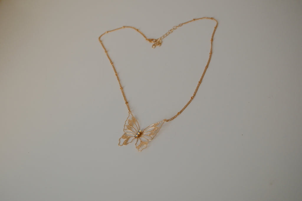 Gold butterfly filigree necklace