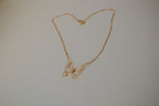Gold butterfly filigree necklace