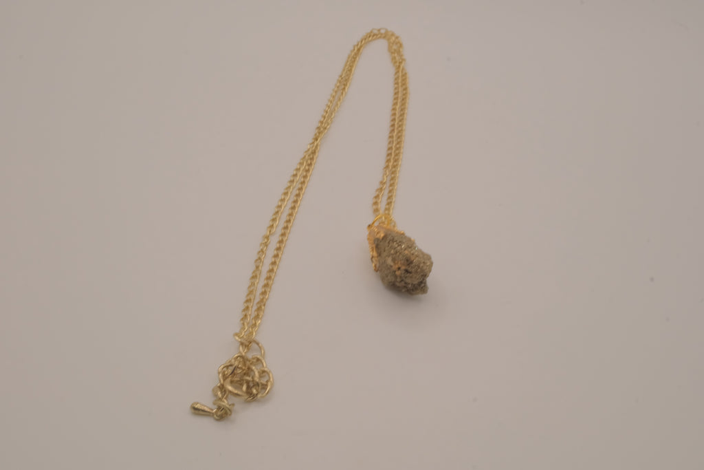 Raw pyrite pendant necklace