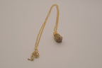 Raw pyrite pendant necklace