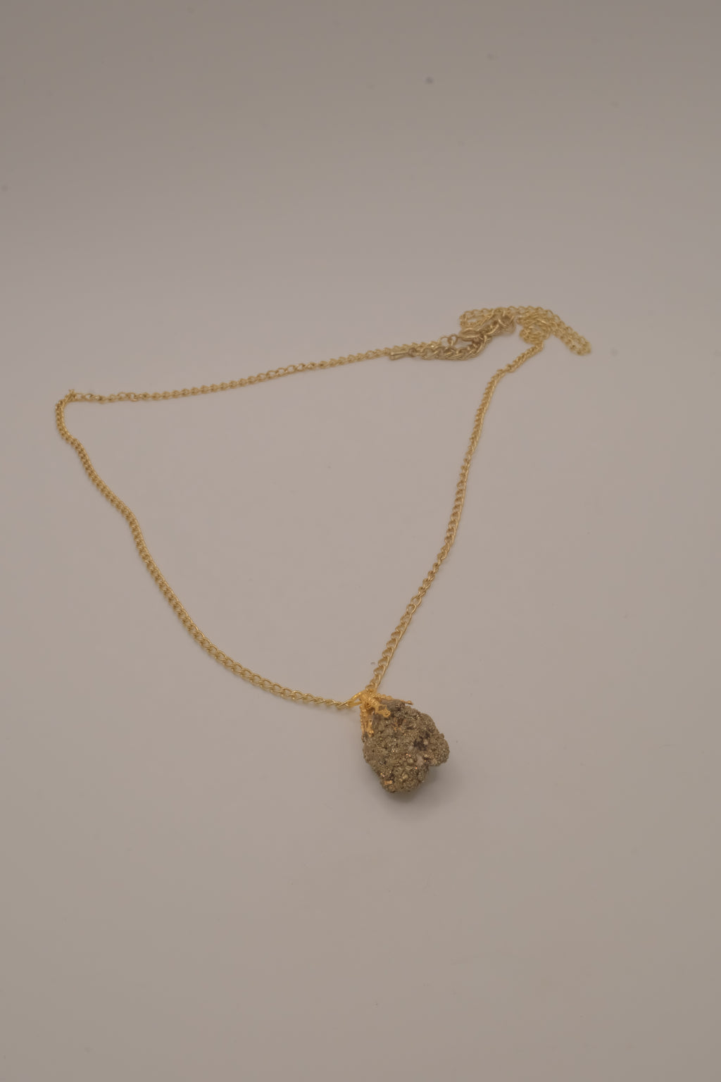 Raw pyrite pendant necklace