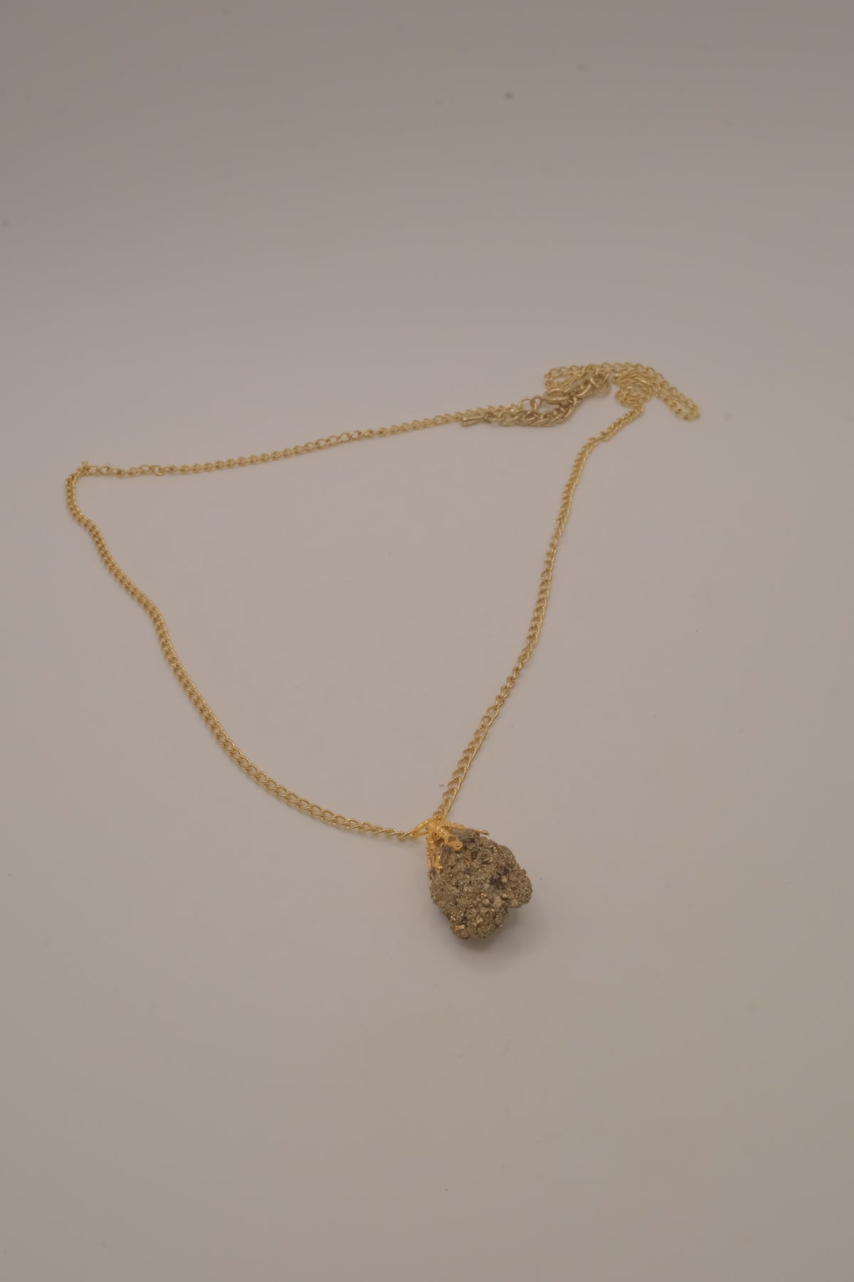 Raw pyrite pendant necklace