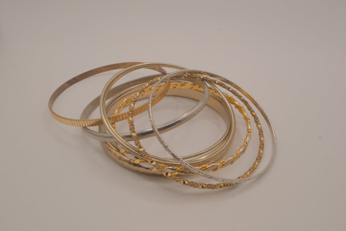 Mixed-metal 9 set stacked bangle bracelets