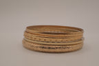 Gold tone 5 set textured stacked bangle bracelets