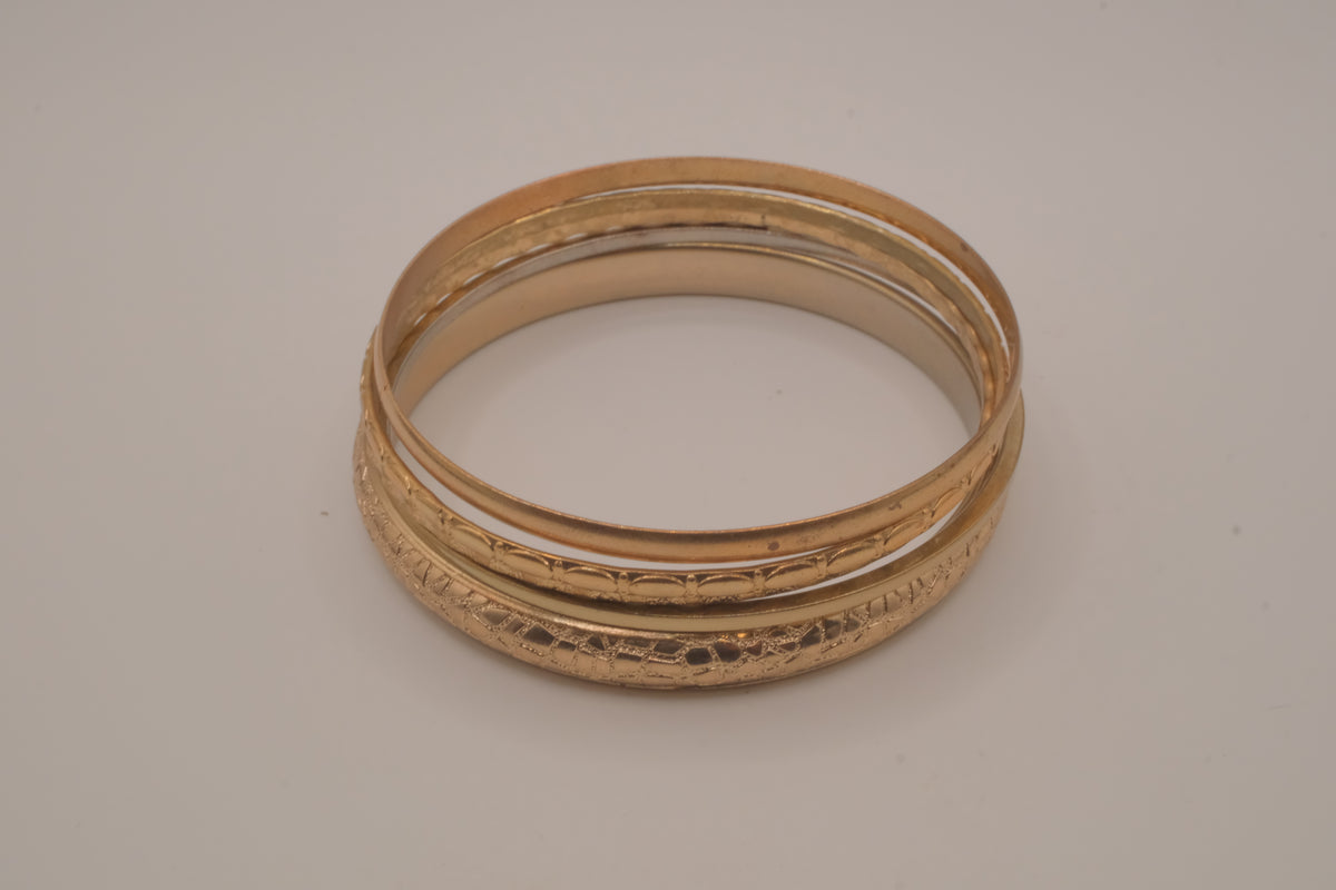 Gold tone 5 set textured stacked bangle bracelets