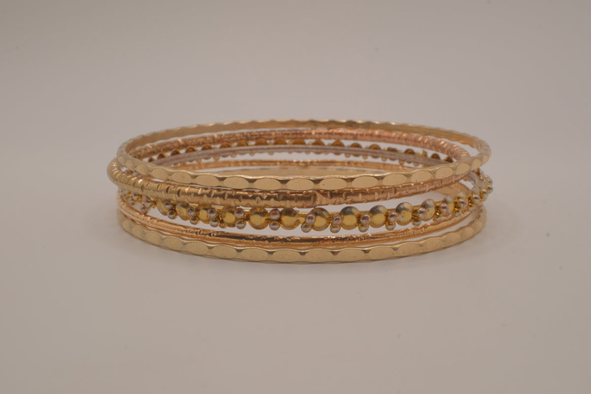 Gold tone 5 set delicate textured stacked bangle bracelets