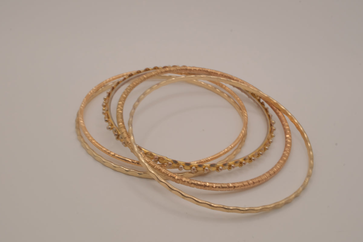 Gold tone 5 set delicate textured stacked bangle bracelets