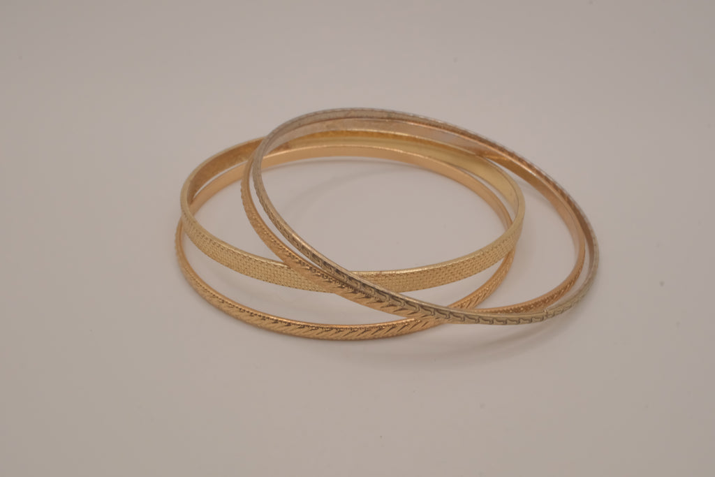 Set of 4 textured gold-tone stacking bangle bracelets