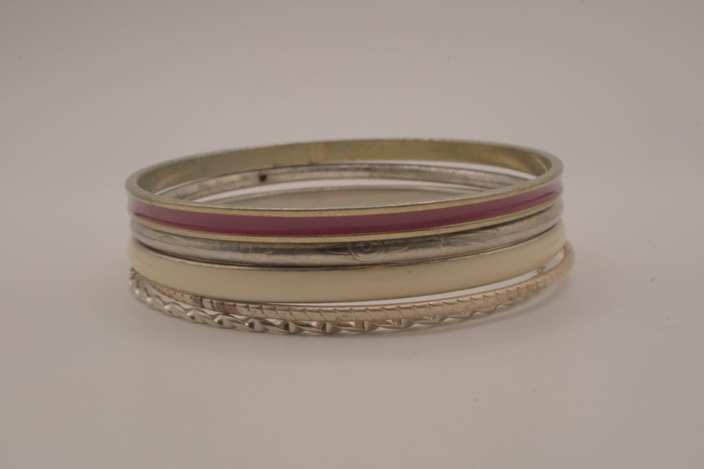 Set of 5 textured silver tone and enamel stacking bangle bracelets
