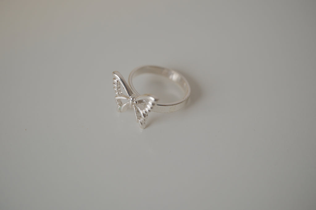 Silver tone delicate butterfly ring