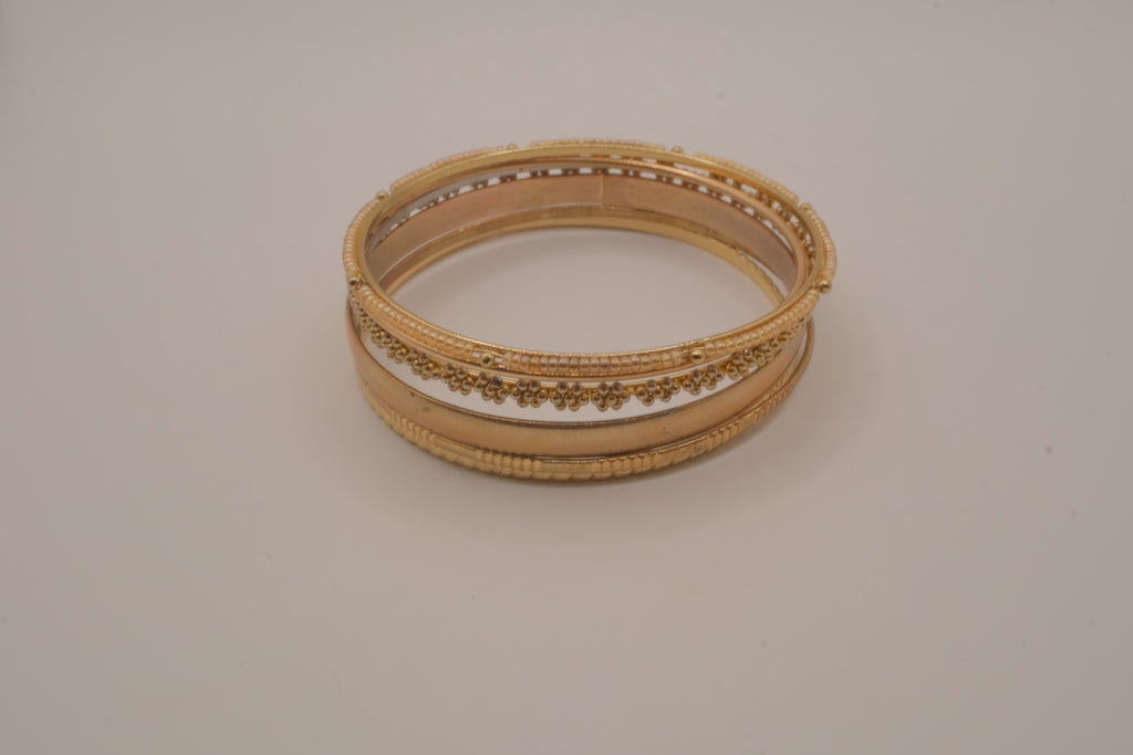 Set of 6 textured and floral gold-tone bangles