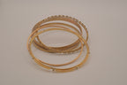 Set of 6 textured and floral gold-tone bangles