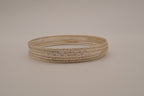 Set of 5 thin, textured silver tone bangle bracelets