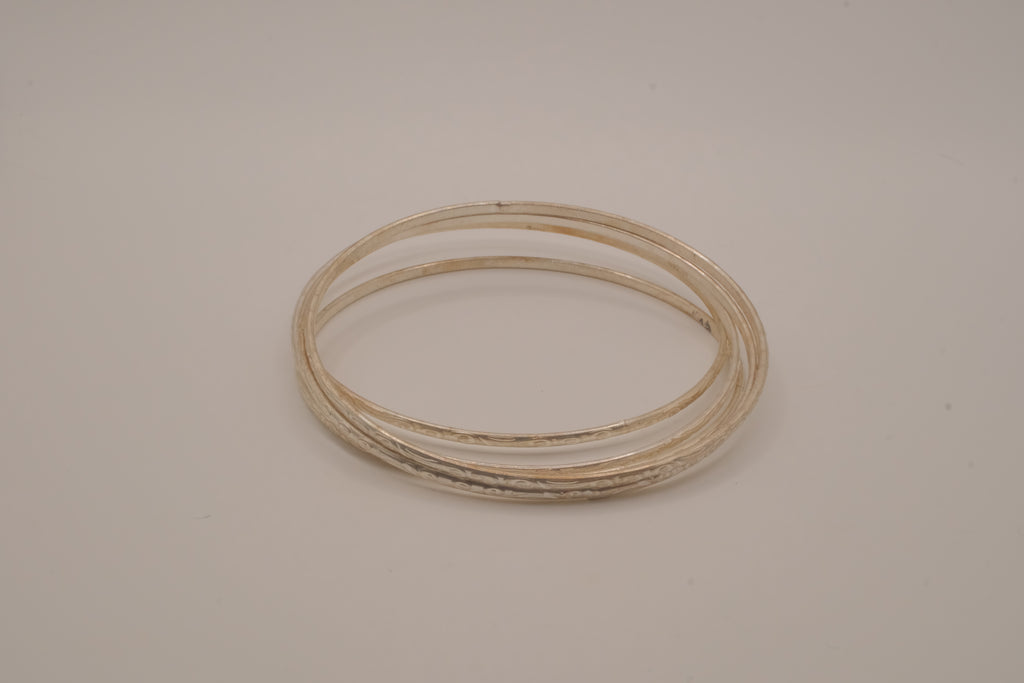 Set of 6 thin, stackable silver bangles